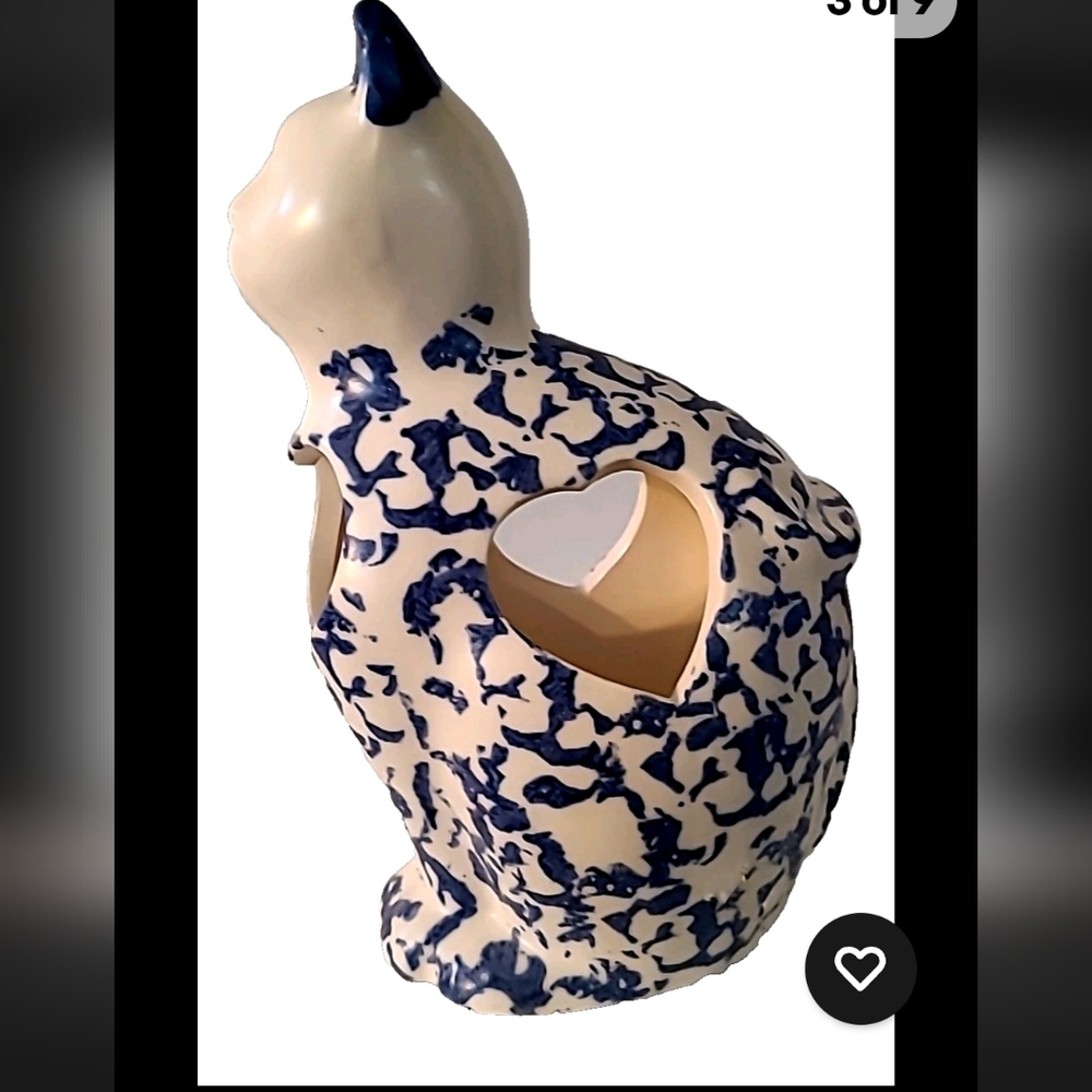 Hand Made Ceramic Cat With Heart Cut Out.